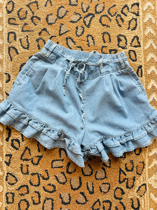 Ruffle Bottom Denim Short in Light or Medium Wash
